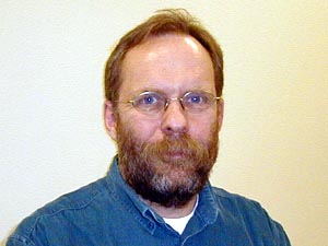 
Computer programmer Tom Anderson expects his pay to be flat, in part because of outsourcing. (MPR Photo/Bill Catlin)