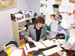 
Adam Levy in his office at Hired. Levy heard tragic stories from many of the teens he worked with. He refers to some of those stories on the Honeydogs' new cd, "10,000 Years." (MPR Photo/Chris Roberts)