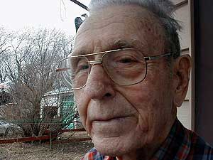 
Earl Reckard is a retired farmer.  He says the Watonwan Feeder Pig Cooperative has caused air problems ever since it started about 27 years ago. (MPR Photo/Mark Steil)