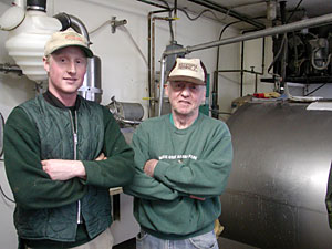 
Nick Meyer has an advantage in starting out in the dairy business.  He's taking over his dad's farm. (MPR Photo/Annie Baxter)