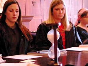 
The class is timed -- by hourglass, of course. (MPR Photo/Marisa Helms)
