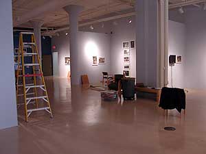 
In the final days before opening, MMAA staff put on the finishing touches to their new exhibition hall. The hall is more open and inviting than their previous space at the Landmark Center. (MPR Photo/Marianne Combs)