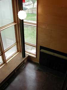 
While urban development emphasizes efficient use of space, architects Wynne Yelland and Paul Neseth recognized that Minnesota winters can create cabin fever. So they designed a spacious living room with high ceilings and tall windows to give a sense of the outdoors. (MPR Photo/Marianne Combs)