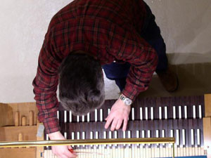 
Why do many organs have "reversed" colors on the keyboard?  Instead of white with black like a piano, many organs (including Shepherd of the Hills) have the opposite:  black "naturals" with white "sharps." (MPR Photo/Valerie Kahler)