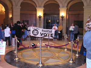 
Supporters of a proposed constitutional ban on same-sex marriage were at the Capitol Friday, urging lawmakers to act on that measure. It seems destined to die from lack of action, along with many other issues still to be resolved. (MPR Photo/Laura McCallum)