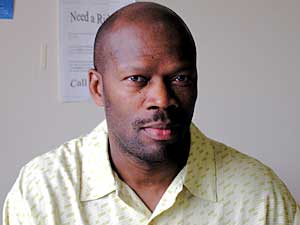
Richard Amos tries to help homeless people find housing fast. He uses money from St. Stephen's Housing Services to help clients pay damage deposits and some of their rent for a few months. (MPR Photo/Lorna Benson)