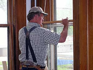 
Lyle Voss says he enjoys working on the Dayton house.  He and Rodney Obermoller are supervising the renovation work. (MPR Photo/Mark Steil)