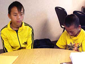
Xiong's sons, 15 and 11, will undergo a health assessment within the next several weeks, before school starts. They will most likely be assigned to a transitional language center.  (MPR Photo/Toni Randolph)