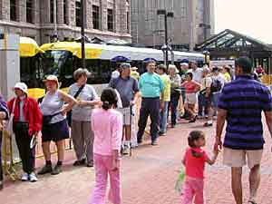 
Lines of people waited to take free rides on the new LRT trains over the weekend. Paid service begins Monday. (MPR Photo/Art Hughes)