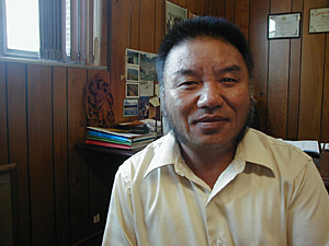 
Yao Lo was among the very first Hmong to come to the U.S. in 1976.  Since then he has since sponsored six related families to come to the U.S.  Some relatives do factory work, some sell insurance, and others run grocery and liquor stores. (MPR Photo/Jeff Horwich)