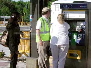 
Many people will buy bus passes through the vending machines at the stations. They expire after two and a half hours. If a bus rider gets a rail transfer, it lasts 22 hours, so it's good for a return trip after work. (MPR Photo/Art Hughes)