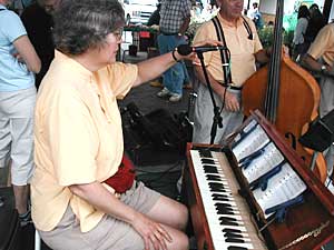 
Skalmusik's Mary Abendroth plays a foot harmonium purchased from a retired Army chaplain (MPR photo/Dan Olson)