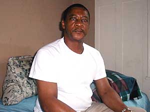 
Marvin lives in the rooming house because he can't get Section 8 housing assistance. His social worker says Marvin and other clients are frozen out of getting Section 8 housing help because of government budget cuts. (MPR Photo/Dan Olson)