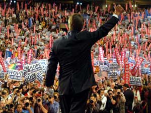 
John Edwards greets the crowd at the Democratic National Convention as he steps onstage Wednesday night. (Photo by William B. Plowman/Getty Images)