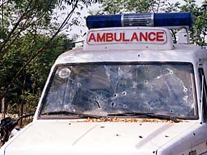 
The Ethiopian government claims the attack against the Anuak was due to ethnic tension. On Dec. 13, 2003, unknown attackers sprayed this vehicel carrying eight highlanders with bullets, killing all the occupants. Anuak separatists were blamed for the killings. A mob mainly composed of highlanders started attacking Anuak neighbors in revenge. (Photo by Doug McGill)