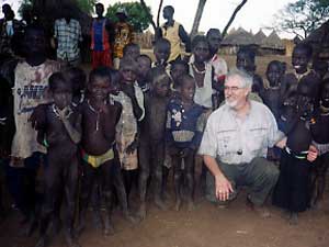 
Reporter Doug McGill, visiting with refugees in Pochalla. (Photo courtesy of Doug McGill)
