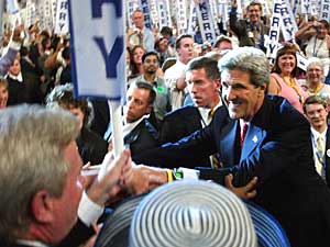 
John Kerry made his way from the back of the convention hall to the front for his speech, shaking hands with enthusiastic supporters along the way. (Photo by Mario Tama/Getty Images)