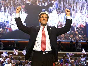 
John Kerry basks in the ovation for him after his acceptance speech Thursday night.  (Photo by HECTOR MATA/AFP/Getty Images)