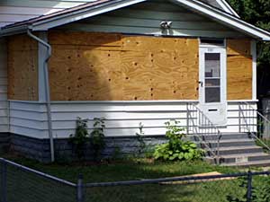 
The tour included a look a dozens of problem properties in the city. (Brandt Williams)