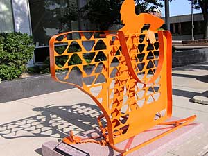 
The bright orange metal sculpture stands out along 8th Street in downtown Sioux Falls.   (Cara Hetland)