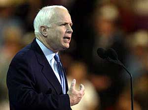 
Sen. John McCain of Arizona did not directly criticize his friend, Democratic presidential candidate John Kerry. But he gave a ringing endorsement to President Bush, saying he has the resolve to make tough decisions and stick with them.  (Photo by PAUL J. RICHARDS/AFP/Getty Images)