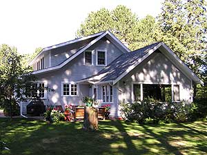 
Sigurd Olson's house in Ely, Minnesota.  The house is now owned by Chuck Wick, a family friend who knew Olson for years, and lived next door.  Many wilderness debates took part in the addition on the side of the house -- once a three-season porch.  (MPR Photo/Bob Kelleher)