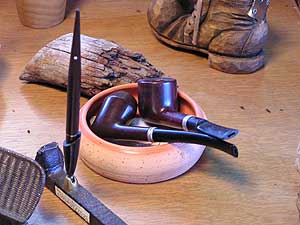 
Sigurd Olson was often photographed with pipe in hand.  He had more than two dozen pipes when he died he 1982. (MPR Photo/Bob Kelleher)