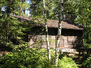 
Sigurd Olson moved this log cabin from the Ely airport to Listening Point.  It provided Olson a refuge in the woods, free from an endless army of visitors who would drop by, unannounced, at Olson's Ely home. (MPR Photo/Bob Kelleher)