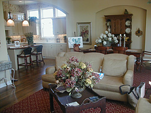 
This is the "great room" of a model home in The Pines, a "villa-style" development in the St. Paul suburb of North Oaks. This particular model townhome has 2,868 finished square feet, in-floor heating, and a gourmet kitchen.  It lists for $622,579. (MPR Photo/Jeff Horwich)