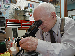 
Jeweler/gemologist/watchmaker Don Streed, 80, bought his Waseca jewelry store 20 years ago.  In his own way, he says retraining, education, and a willingness to change are the keys to success in any economy. (MPR Photo/Jeff Horwich)