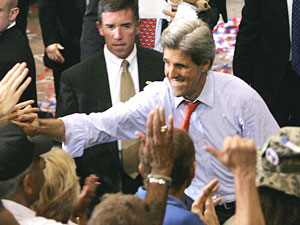 
  Democratic presidential candidate Senator John Kerry (D-MA) greets the crowd after speaking at a rally on Wednesday in Madison, Wisconsin. The latest MPR poll shows Kerry's support in Minnesota is slipping. (Photo by Mark Wilson/Getty Images)