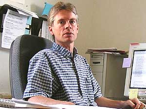 
Marshall Helmberger is officially the publisher of the paper, be he also writes editorials, a column, news stories, and takes photos. (MPR Photo/Chris Julin)