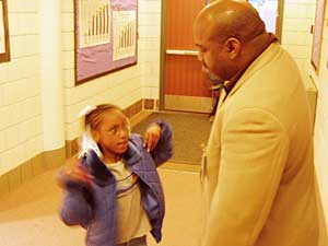 
Principal Von Sheppard stands near the school entrance every morning as students arrive. (MPR Photo/Tim Pugmire)