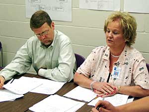 
Paul Wahmanholm and Marilyn Wojtasiak discuss teaching strategy. (MPR Photo/Tim Pugmire)