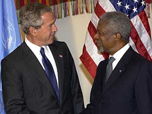 
President Bush and U.N. General Secretary Kofi Annan greet each other before the opening session of the U.N. General Assembly Tuesday. Last week Annan criticized the U.S. invasion of Iraq, calling the action illegal. (Photo by STAN HONDA/AFP/Getty Images)
