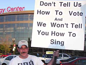 
Across the street from the Xcel Energy Center, a group called Protest Warriors was picketing the concert. The group supports President Bush, and carried signs mocking what they call Kerry's liberal ideology. (MPR Photo/Chris Roberts)