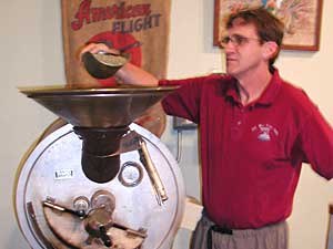 
Old Man River Cafe owner Jon Kerr and his partner installed a one-killowatt solar energy system to generate enough energy to power the coffee roaster. (MPR Photo/Marisa Helms)