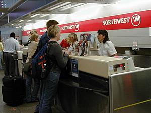 
 Northwest Airlines has been seeking labor concessions worth $950 million
a year, and the pilots were the first group to negotiate. The
airline has lost $2.1 billion on operations since the beginning of
2001. (MPR file photo)