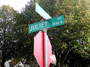 
Street sign. On Juliet Avenue in St. Paul, a silent political sign war is being waged. (MPR photo/Chris Roberts)