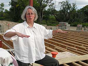 
Station Manager Maggie Montgomery shows off the new home for KAXE, under construction in downtown Grand Rapids. (MPR Photo/Stephanie Hemphill)