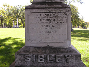 
Henry Sibley was Minnesota's first state governor. His gravestone is an obelisk. This view shows his weather-worn name at the base of his marker. (MPR Photo/Lorna Benson)