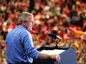
President Bush spoke before a crowd of some 23,000 at the Target Center in Minneapolis Saturday, trying to become the first Republican to win the state in 30 years. (Photo by Tim Sloan/AFP/Getty Images)