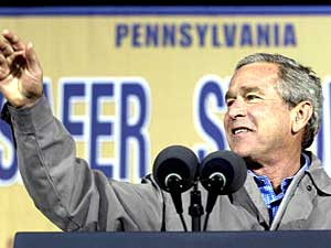 
President George W. Bush addressed a crowd of supporters at one of eight planned campaign stops Monday in Burgettstown, Pennsylvania.  (Photo by TIM SLOAN/AFP/Getty Images)