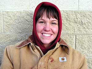 
Cassie Lessman is a senior animal science major at the University of Minnesota. She's among dozens of students who are assisting the DNR's chronic wasting disease testing program. (MPR photo/Tom Robertson)