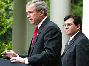 
White House legal counsel Alberto Gonzalez, right, shown here with President Bush, is considered a top candidate to become the next U.S. attorney general.  He would replace John Ashcroft, who announced his resignation Tuesday.   (Photo by Mark Wilson/Getty Images)