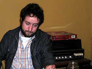 
Martin Devaney in his dining room office. His new CD features straight ahead rock and roll. No frills, no electronic experimentation, no meandering lyrics. (MPR photo/Chris Roberts)