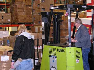 
Forklifts are needed to stack pallets of food at the Great Plains Food Bank in Fargo, North Dakota. (MPR Photo/Bob Reha)
