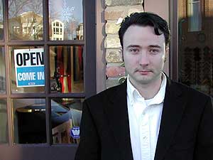 
Leonid Shchigel, outside his new art gallery. He's not sure what kind of business he'll do in Wayzata, but he's made a lot of sales to Europeon buyers through the Internet.  (MPR photo/Chris Roberts)