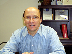 
Allina's David Orbuch says it's costly to implement electronic medical records in hospitals and clinics. (MPR Photo)