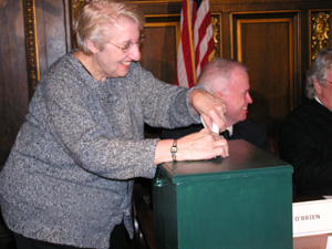 
Vi Grooms-Alban of Cohasset casts her electoral vote (MPR Photo/Laura McCallum)
